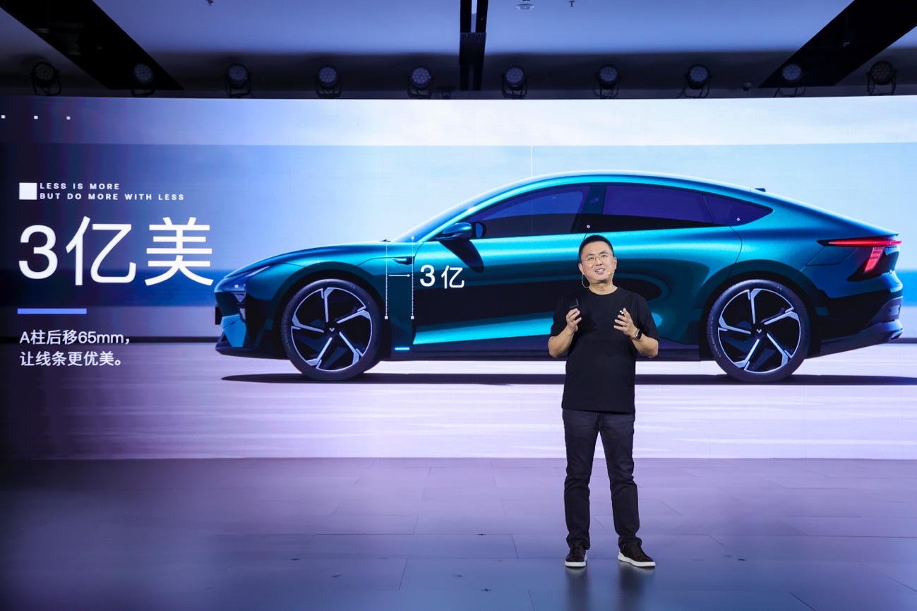 There is a blue sports car on the road.Medium confidence description has been generated automatically.