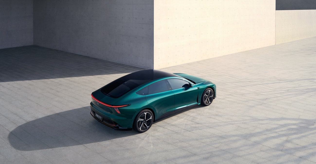 Green carDescription has been automatically generated.